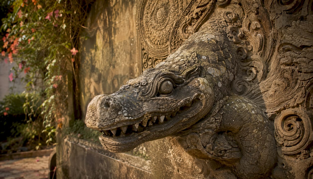 Close-up of makara stone carving in temple