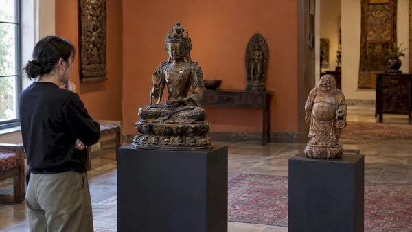 Bronze and resin Asian sculptures compared
