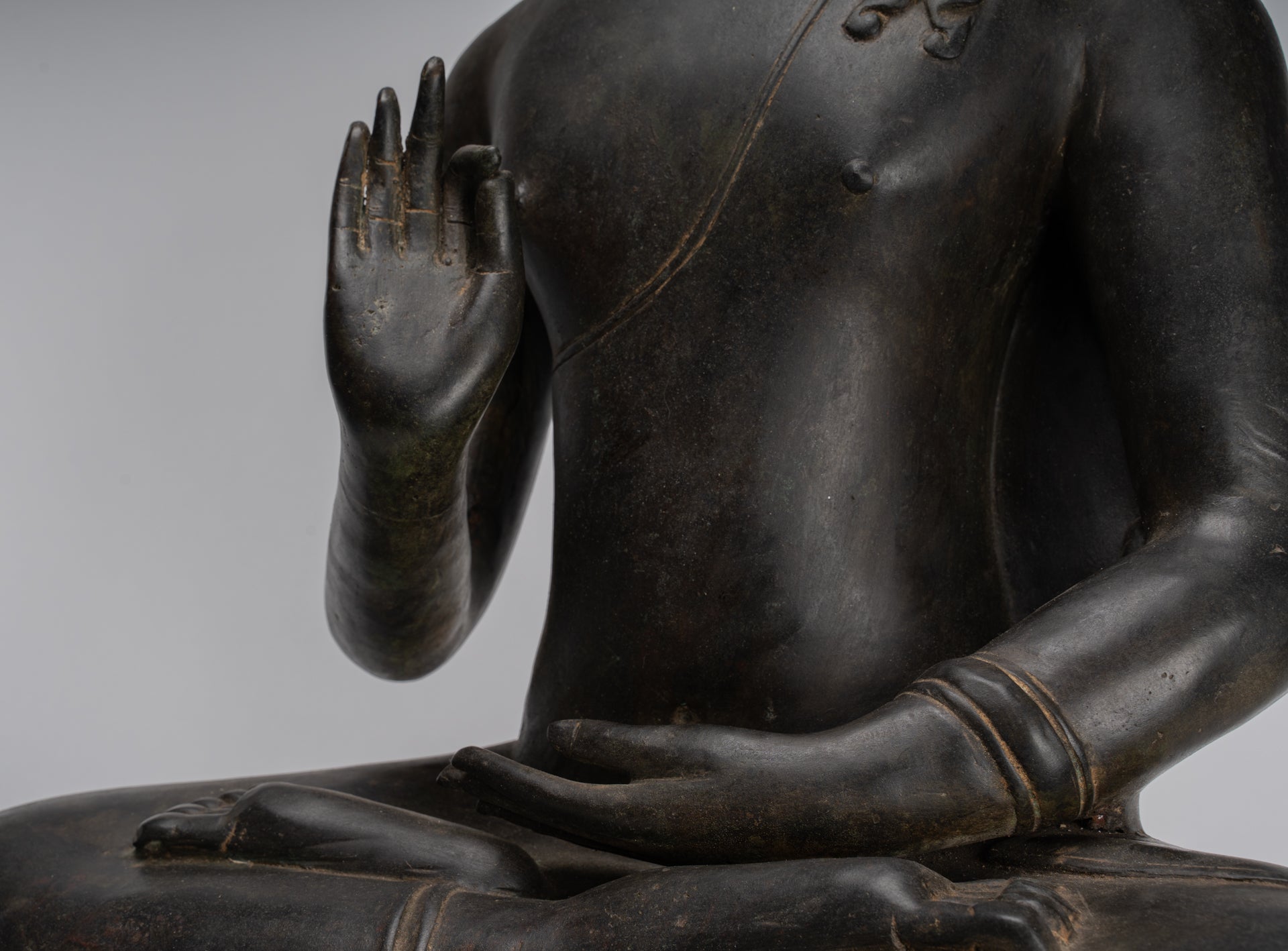 What does the Buddha's hand gesture signify? - Quora