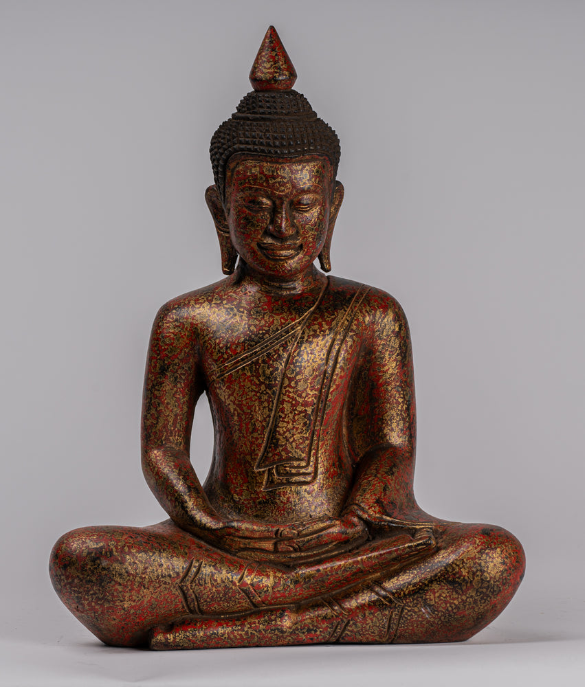 Grande statue de Bouddha en bois dans la pose de témoin de la